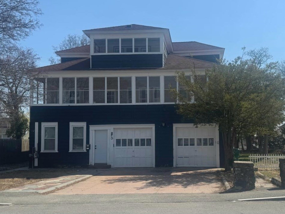 85 Seneca Street Lowell, MA 01852 - Photo 2 of 16 a front view of a building