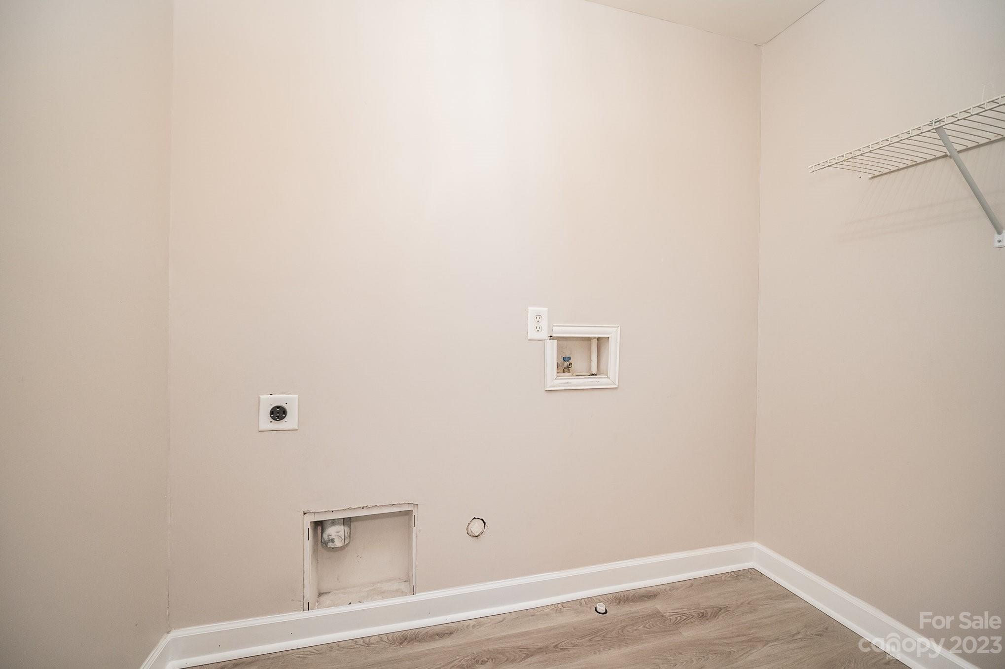 1400 Key Ridge Court Charlotte, NC 28216 - Photo 16 of 27 a view of a small space with wooden floor