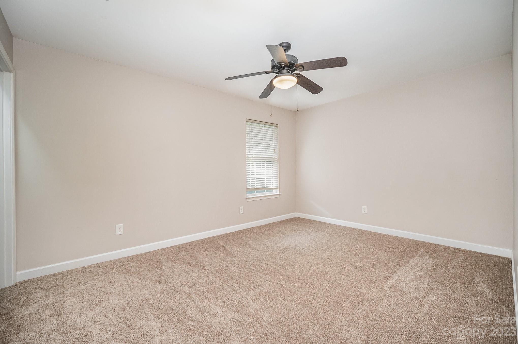 1400 Key Ridge Court Charlotte, NC 28216 - Photo 17 of 27 a view of an empty room with a window