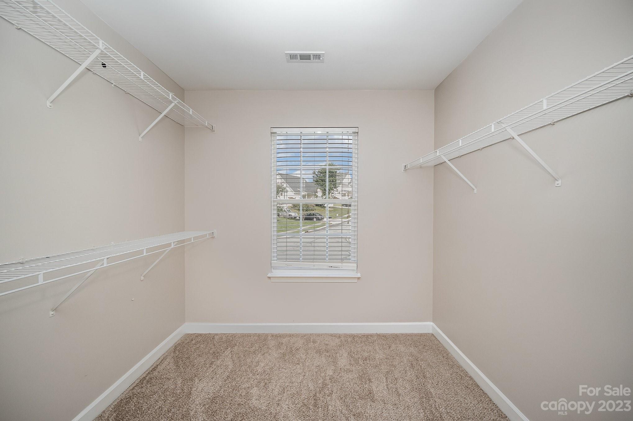 1400 Key Ridge Court Charlotte, NC 28216 - Photo 24 of 27 a view of an empty room with a window