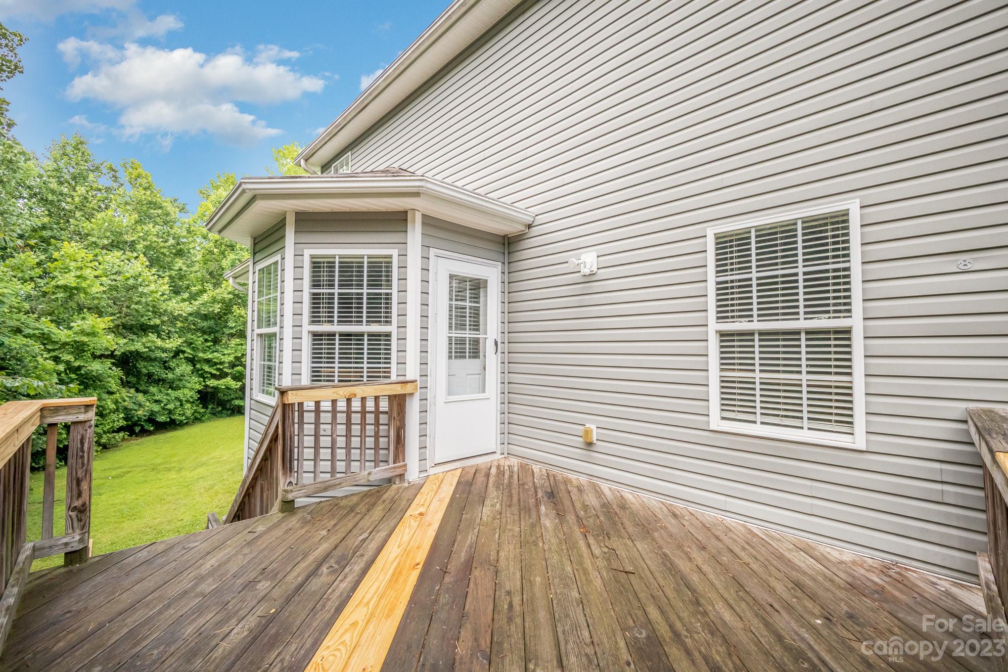 1400 Key Ridge Court Charlotte, NC 28216 - Photo 25 of 27 a view of a house with a roof deck