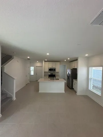a view of a livingroom with a furniture