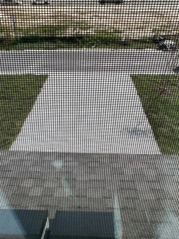 a kitchen with stainless steel appliances a refrigerator and a stove