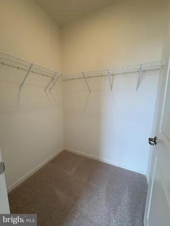 a bedroom with bed and tv