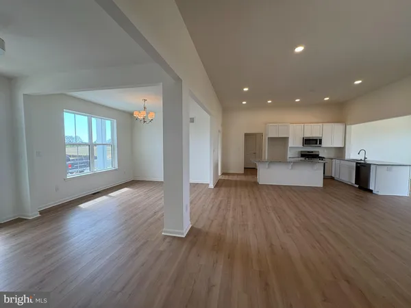 a view of kitchen and wooden floor