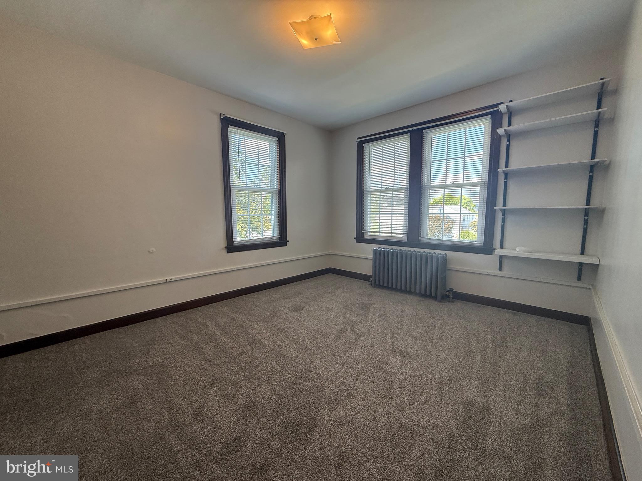 224 Pershing Boulevard Reading, PA 19607 - Photo 11 of 24 an empty room with windows