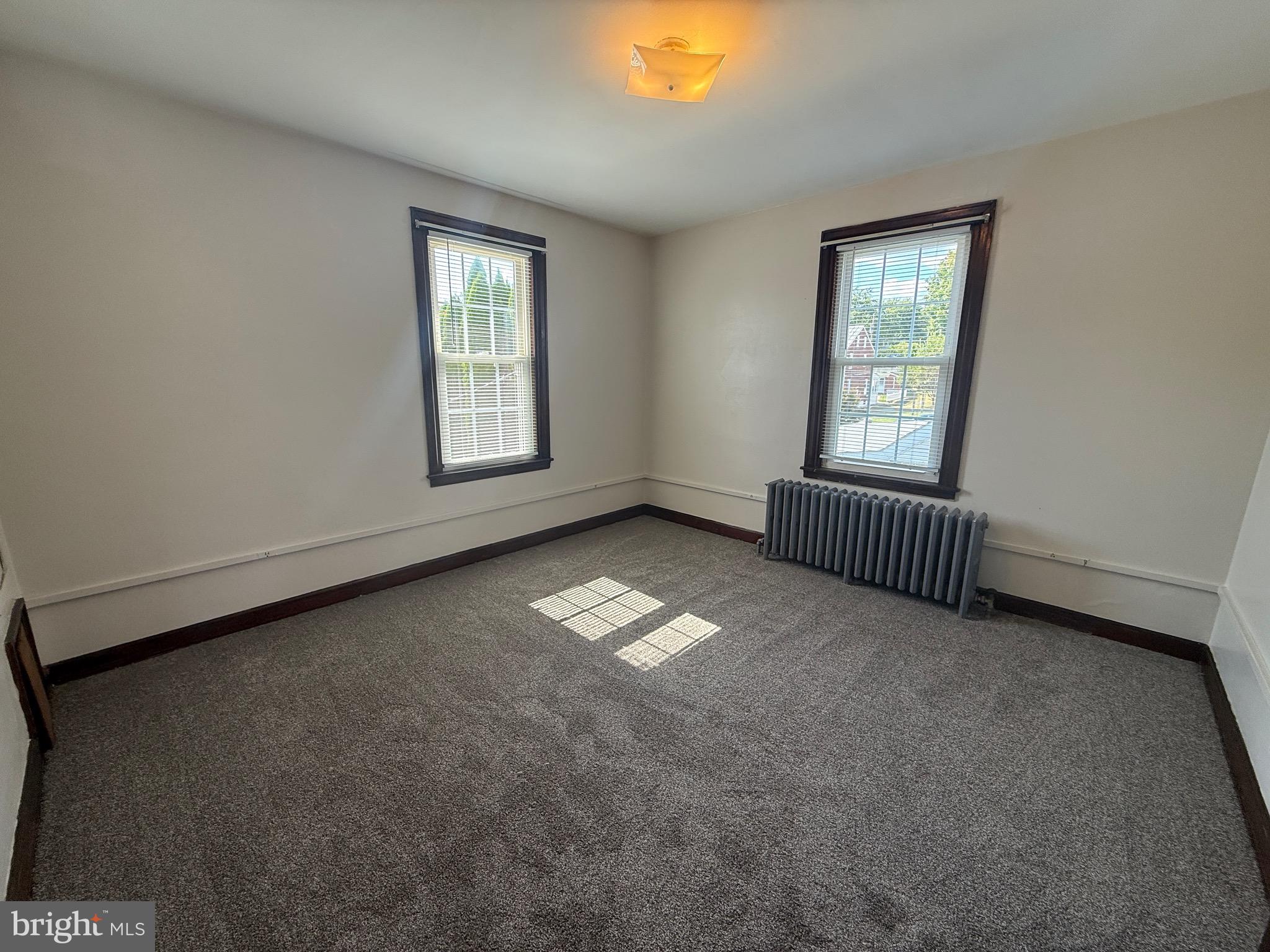 224 Pershing Boulevard Reading, PA 19607 - Photo 10 of 24 a view of an empty room with a window