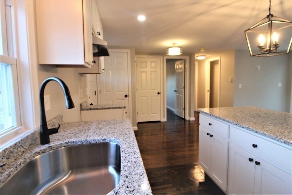 61 Chipaway Road Freetown, MA 02717 - Photo 10 of 27 a kitchen with stainless steel appliances granite countertop a sink and a granite counter tops