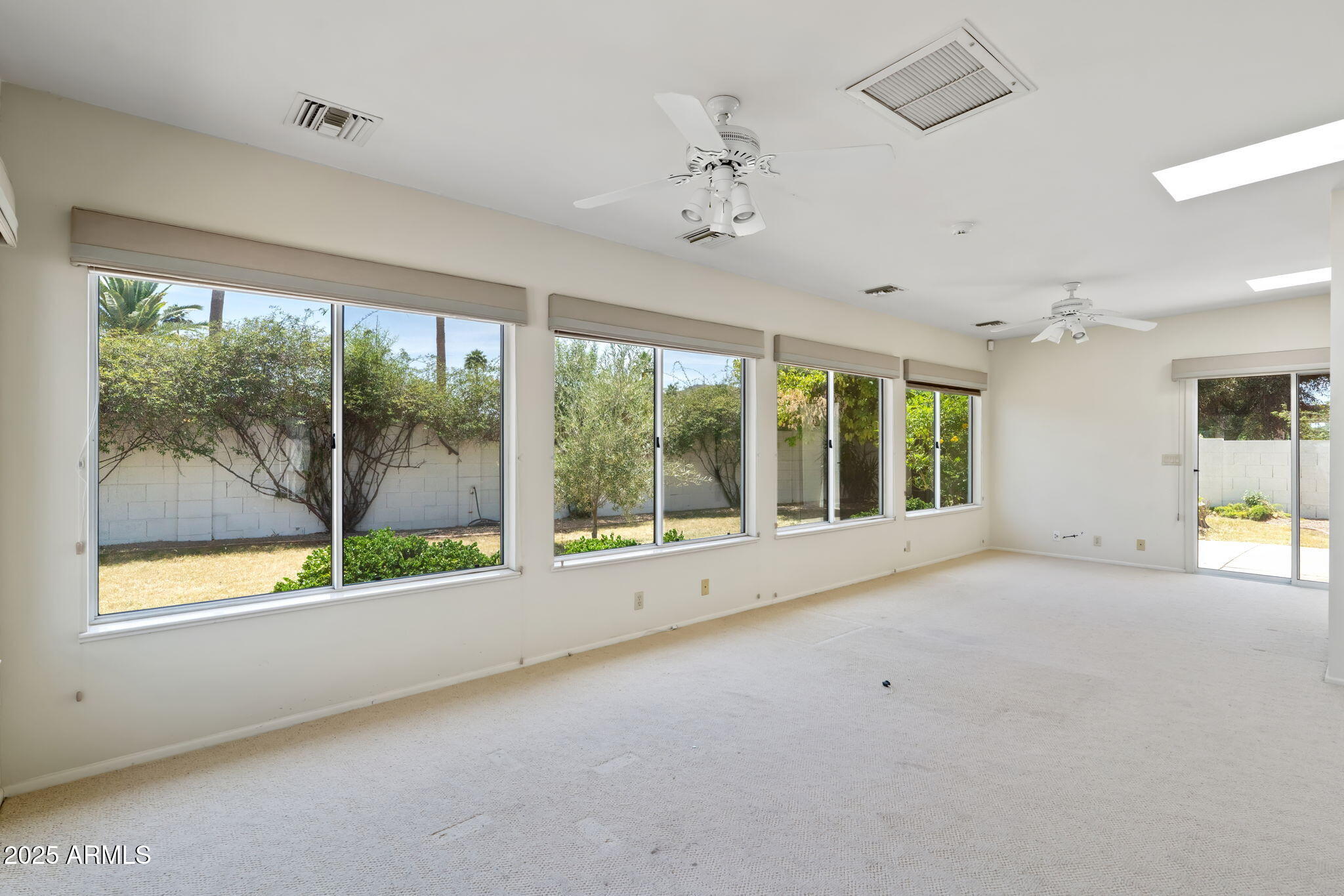 113 East Boca Raton Road Phoenix, AZ 85022 - Photo 22 of 57 a view of an empty room with a window