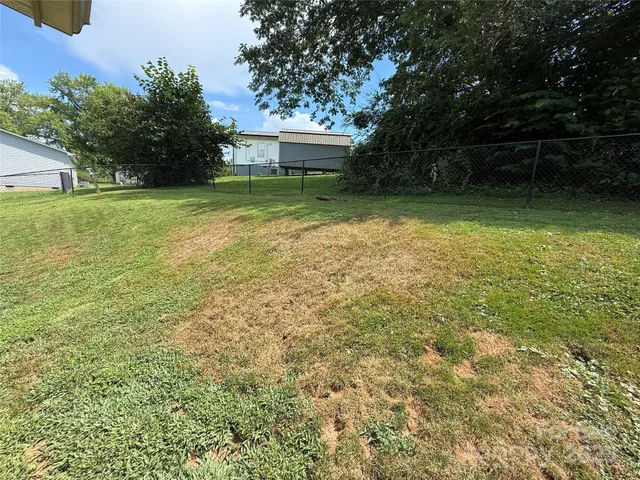 a view of a backyard with a garden
