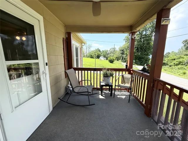 a view of chairs in the balcony