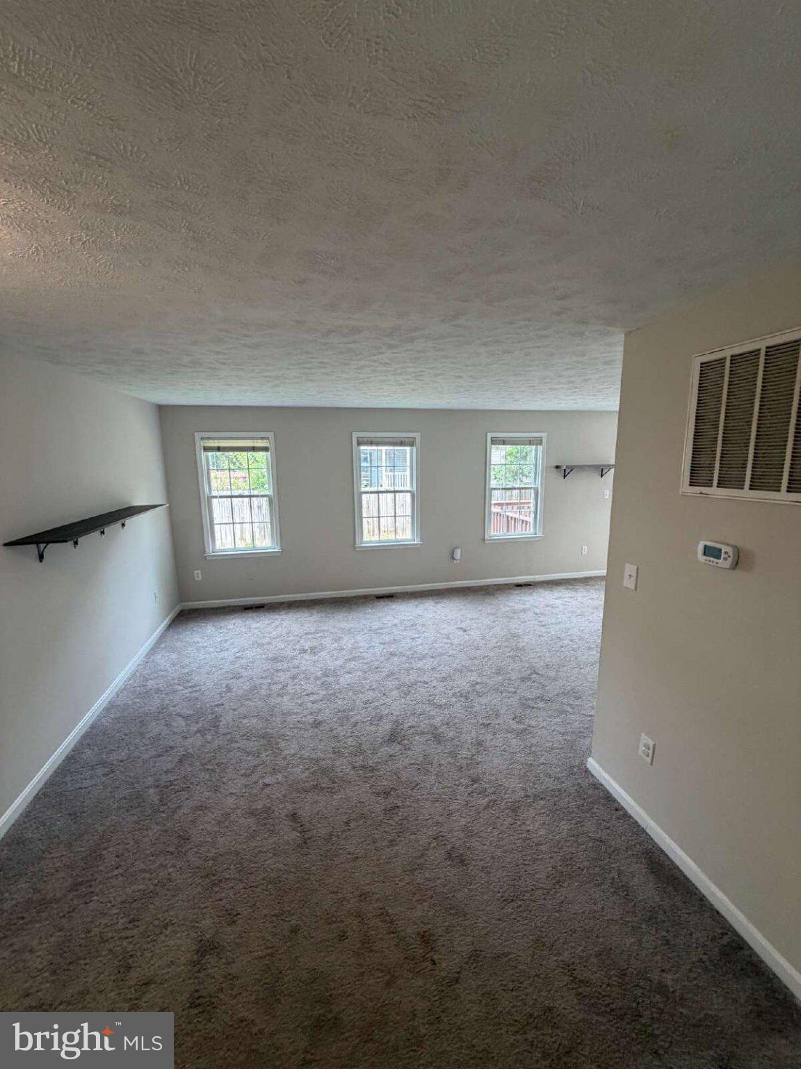 313 3rd Street Colonial Beach, VA 22443 - Photo 26 of 36 Spacious room with natural light.