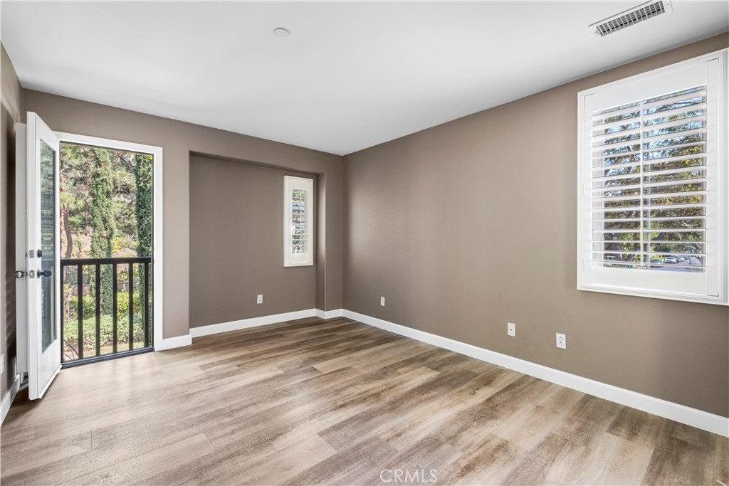 61 Bellwind Irvine, CA 92603 - Photo 14 of 23 a view of an empty room with a window