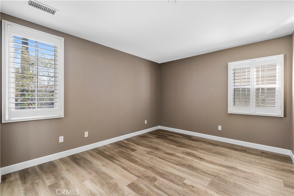 61 Bellwind Irvine, CA 92603 - Photo 16 of 23 a view of empty room with windows