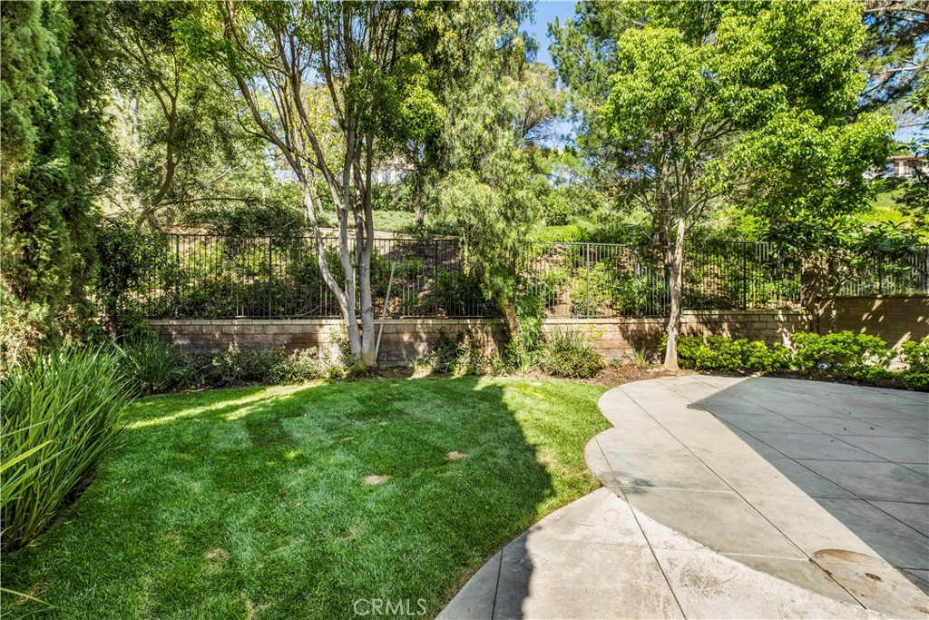 61 Bellwind Irvine, CA 92603 - Photo 18 of 23 a view of backyard with green space