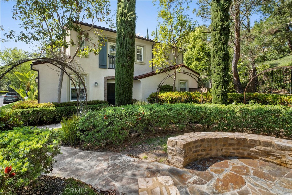 61 Bellwind Irvine, CA 92603 - Photo 3 of 23 a view of a garden with plants