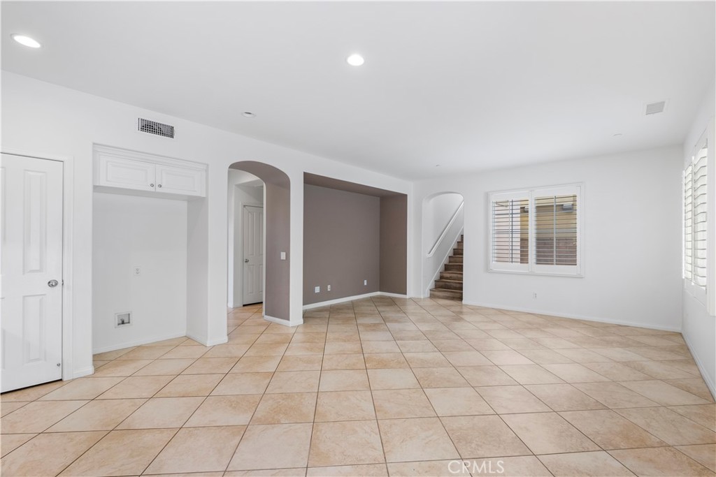 61 Bellwind Irvine, CA 92603 - Photo 8 of 23 a view of empty room with windows