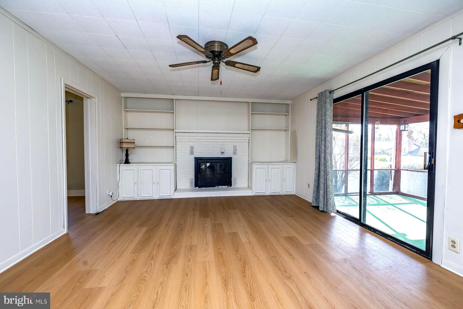 1520 Chestnut Avenue Haddon Heights, NJ 08035 - Photo 14 of 33 a view of empty room with wooden floor and fireplace