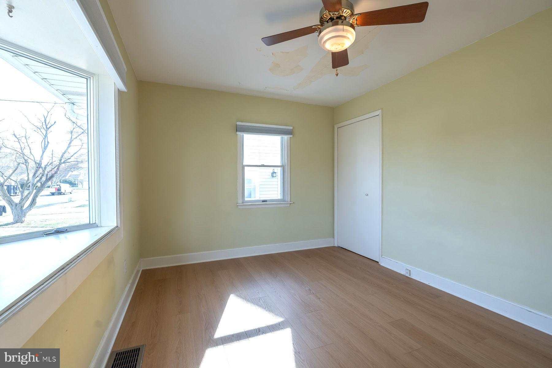 1520 Chestnut Avenue Haddon Heights, NJ 08035 - Photo 16 of 33 a view of empty room with wooden floor and fan