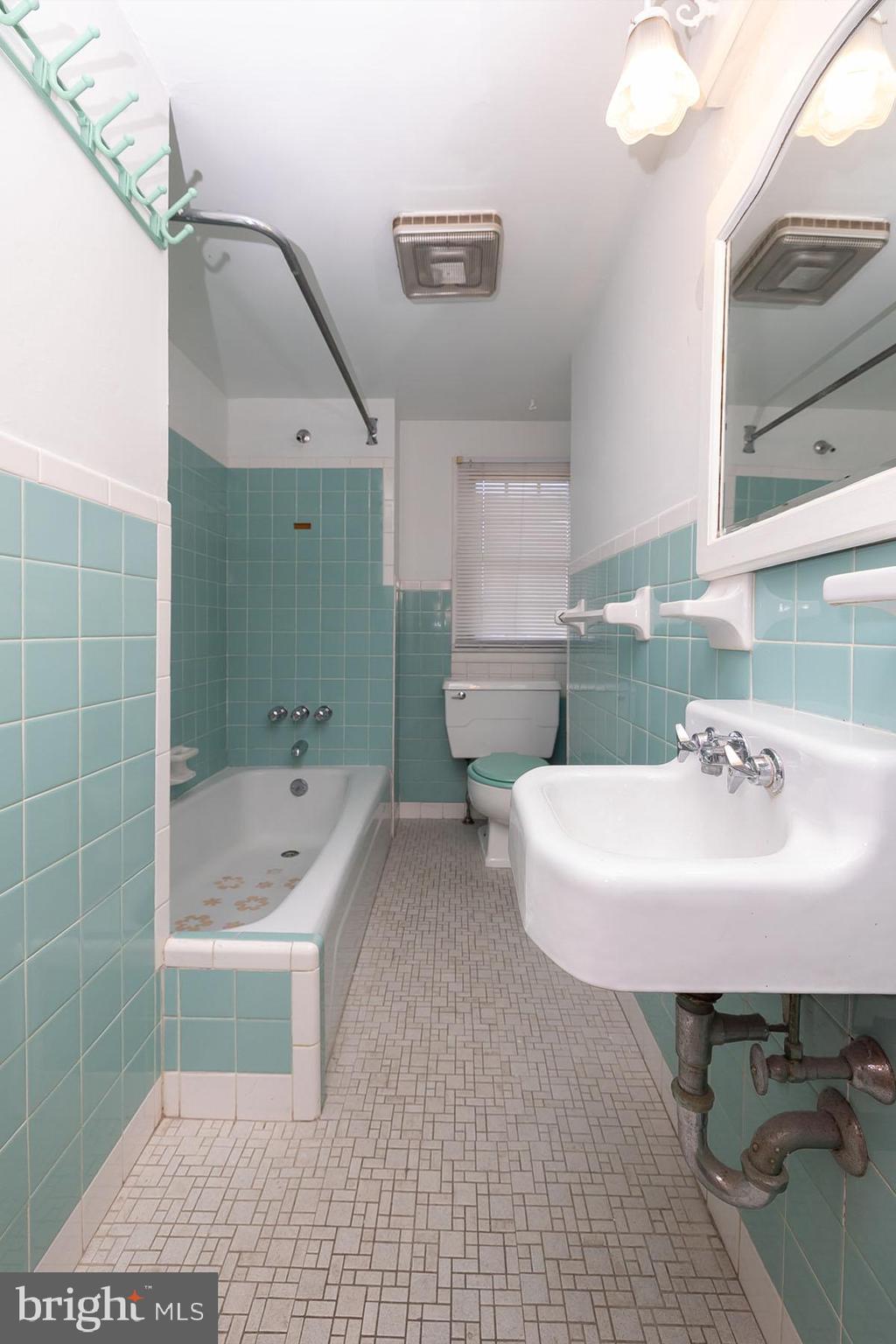 1520 Chestnut Avenue Haddon Heights, NJ 08035 - Photo 22 of 33 a bathroom with a sink a toilet and shower