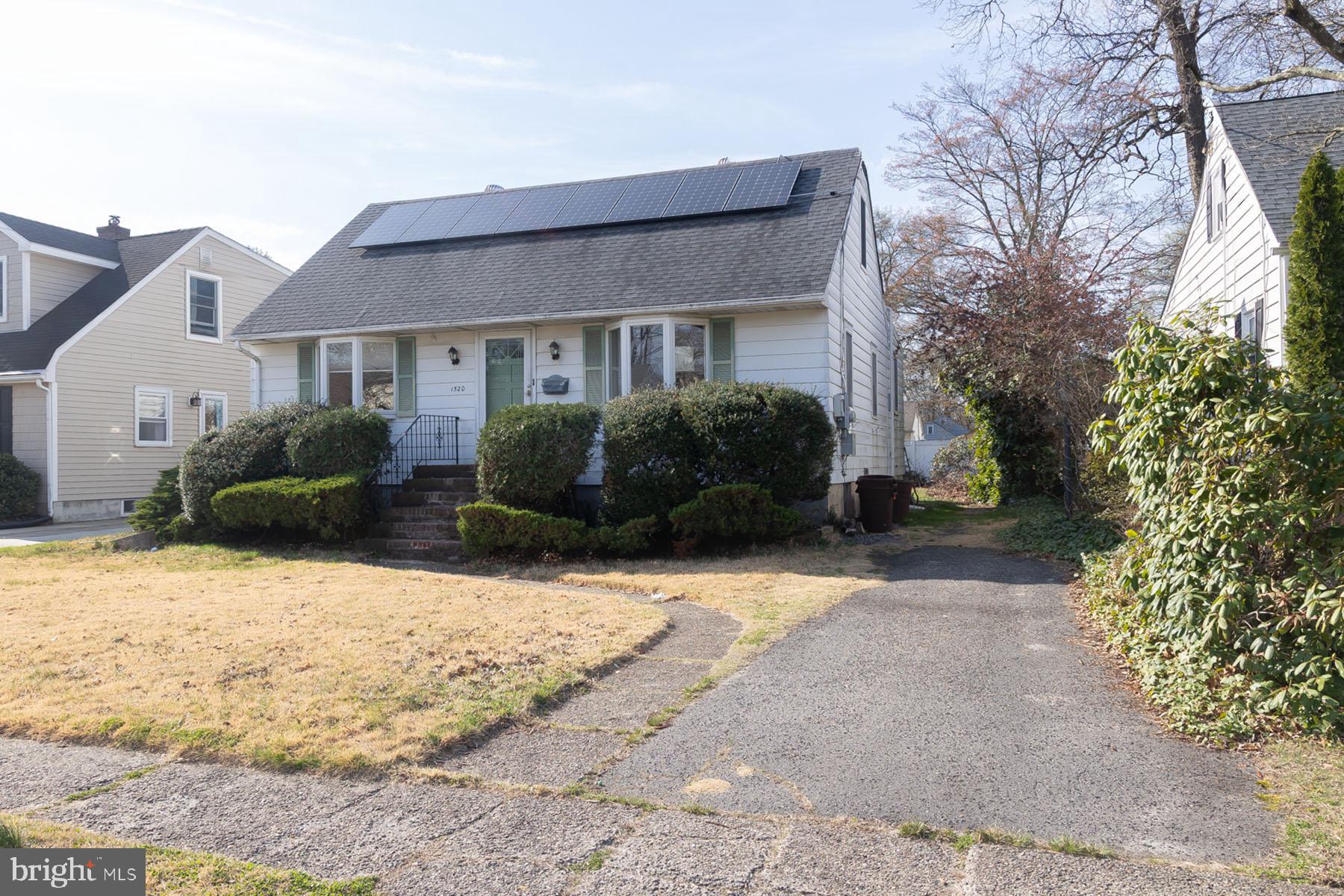 1520 Chestnut Avenue Haddon Heights, NJ 08035 - Photo 4 of 33 a front view of a house with a yard