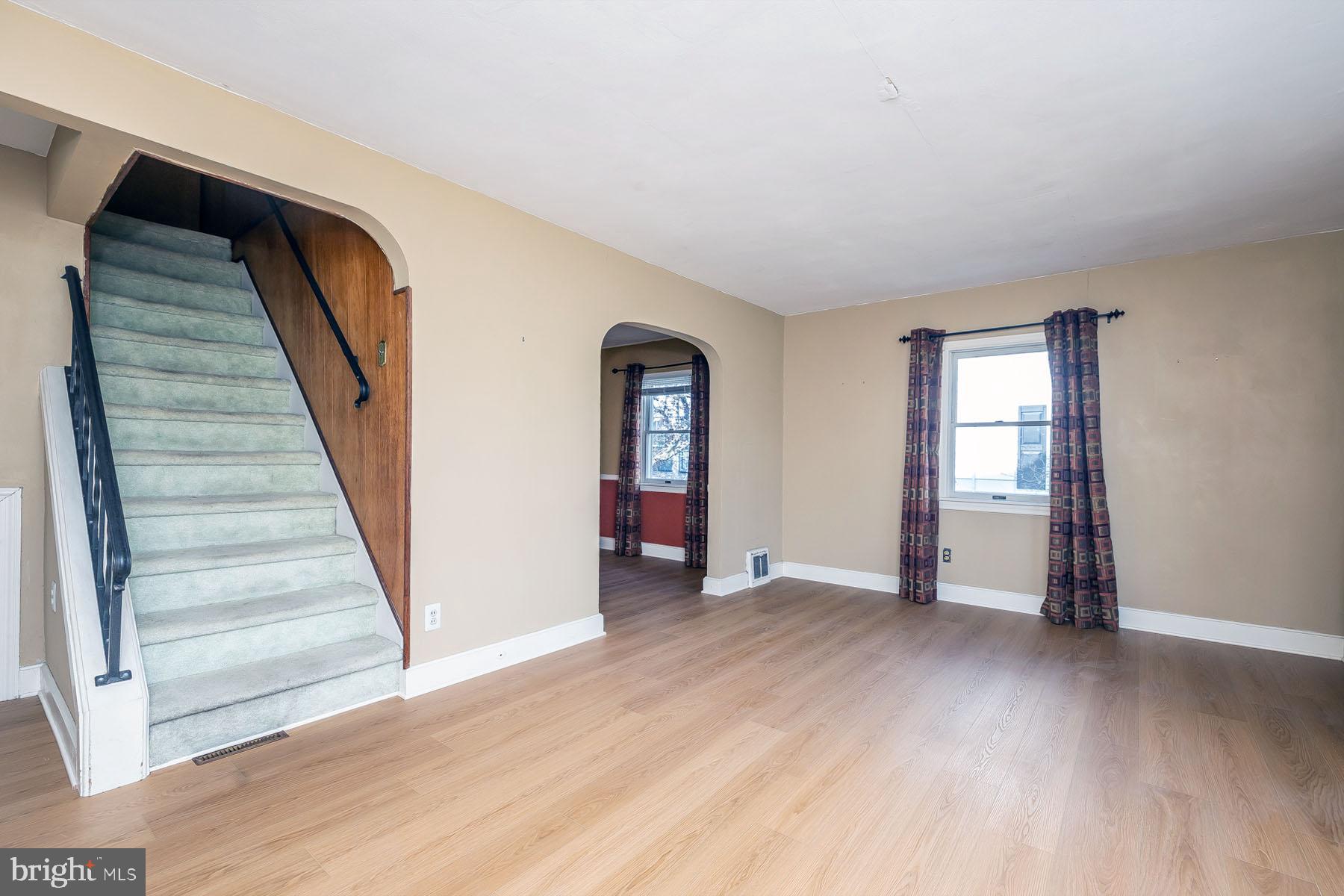 1520 Chestnut Avenue Haddon Heights, NJ 08035 - Photo 7 of 33 a view of an empty room with wooden floor and a window