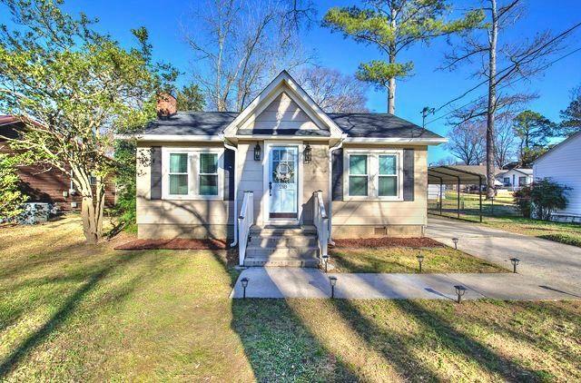 218 Chestnut Street Cedartown, GA 30125 - Photo 1 of 1 a view of a house with a swimming pool