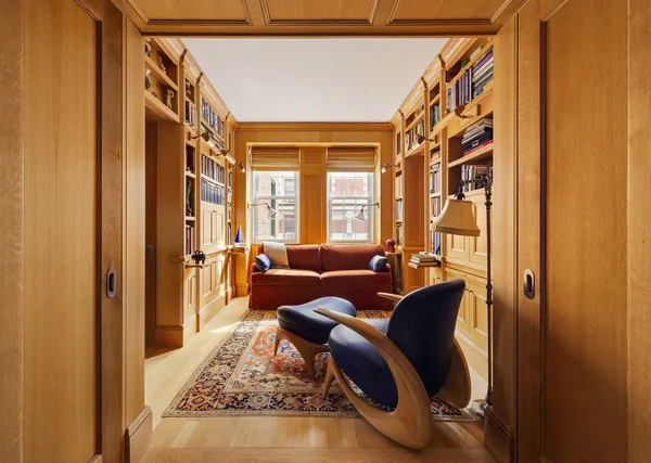 a view of a dining room with furniture and window