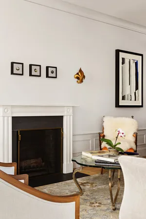 a living room with furniture and a rug