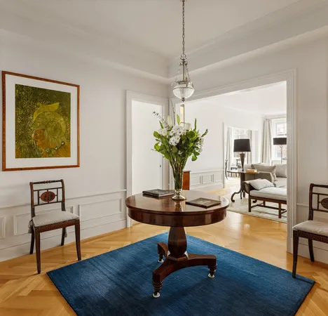 a view of a livingroom with furniture and a chandelier