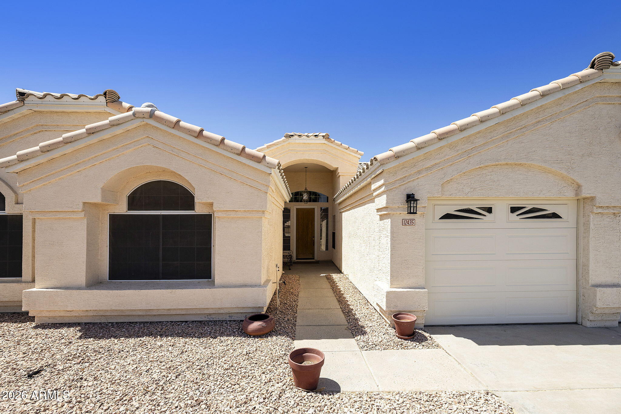 12435 West Monte Vista Road Avondale, AZ 85392 - Photo 69 of 69 a front view of a house