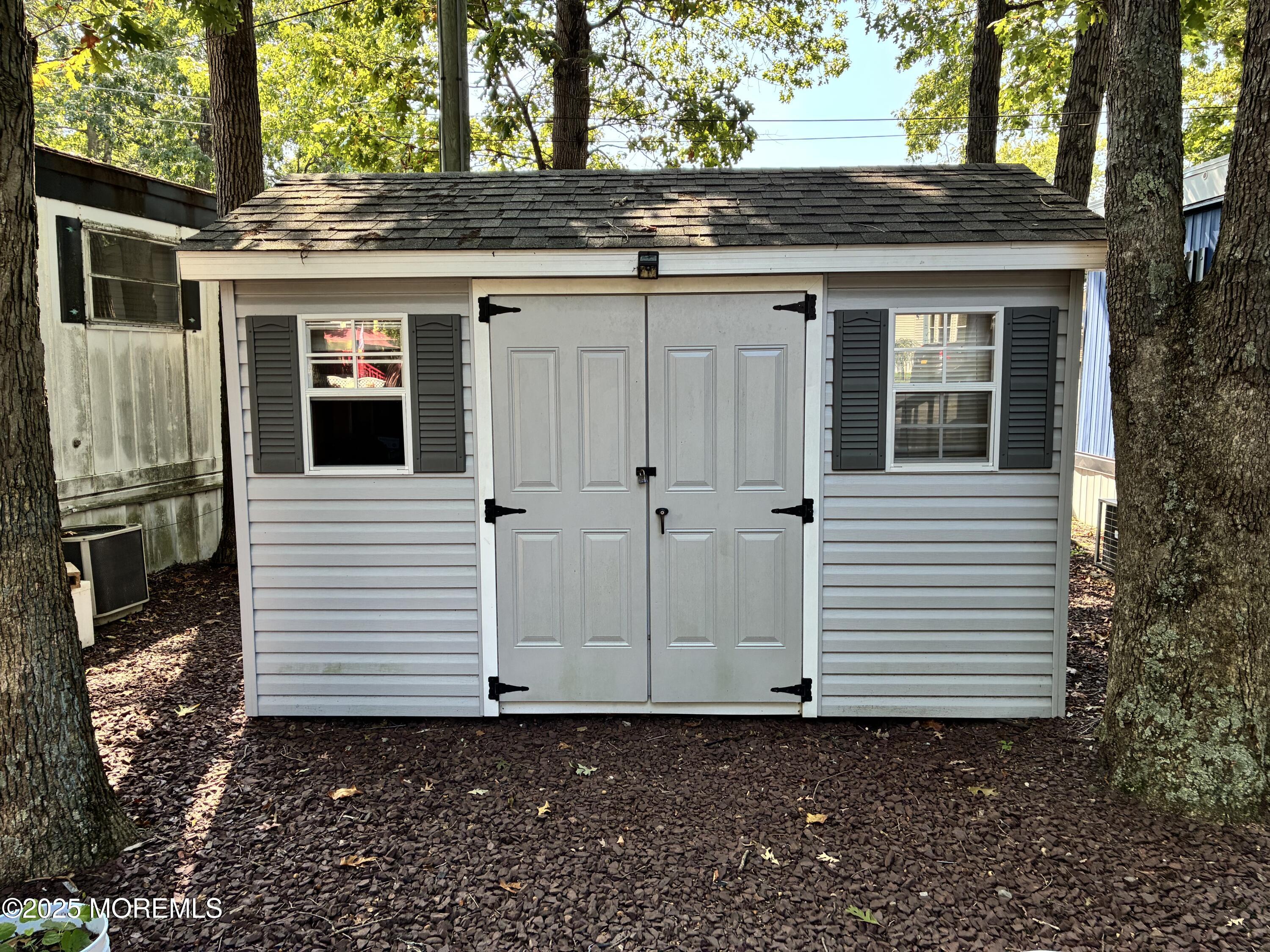 12 D Trail Brick, NJ 08724 - Photo 13 of 17 a view of a house with a yard
