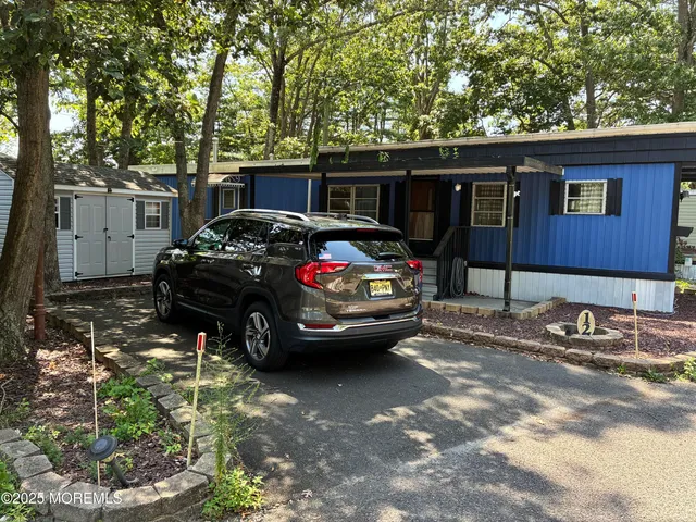 a car parked in front of a house