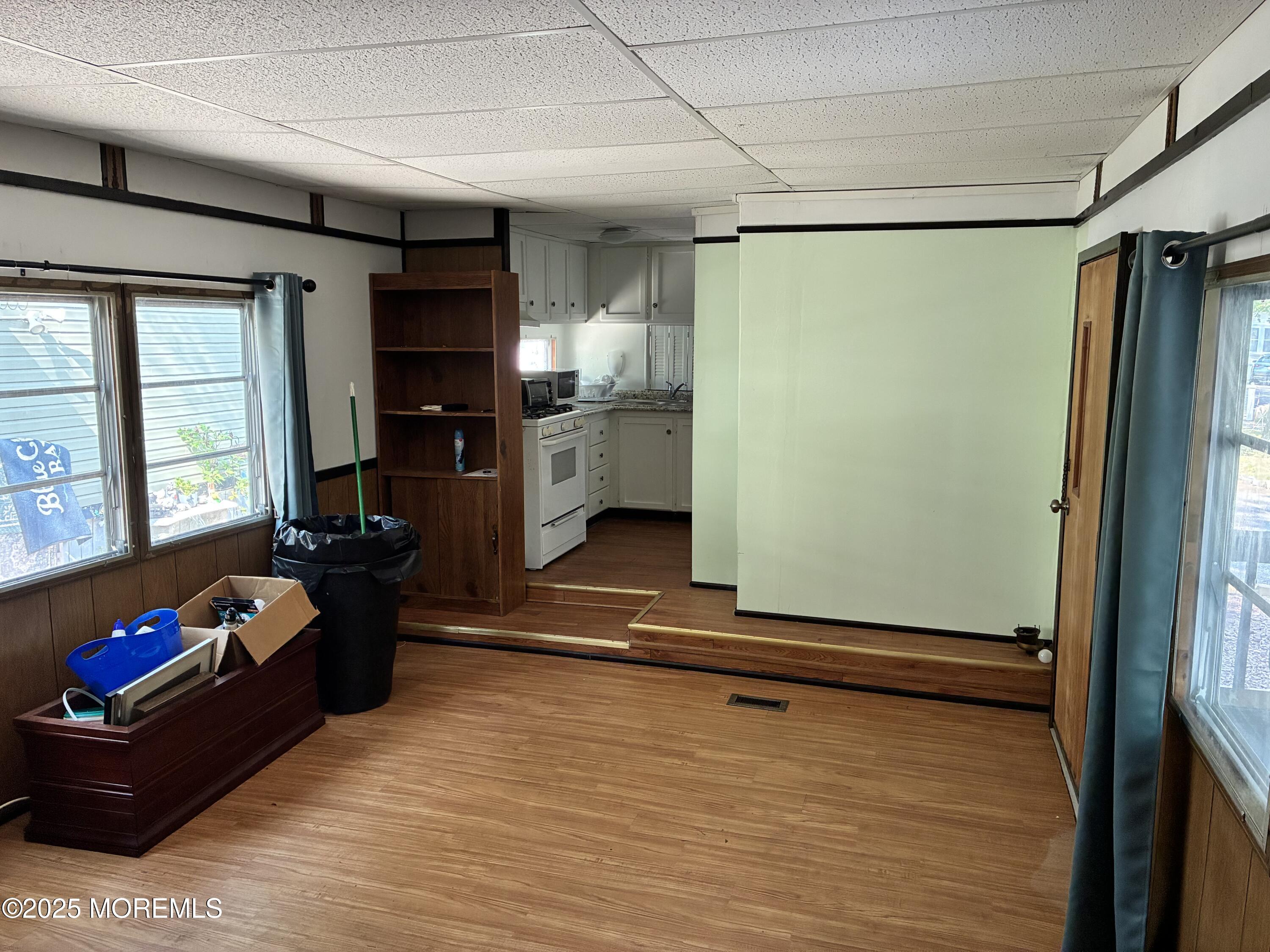 12 D Trail Brick, NJ 08724 - Photo 4 of 17 a living room with furniture gym equipment and a large window