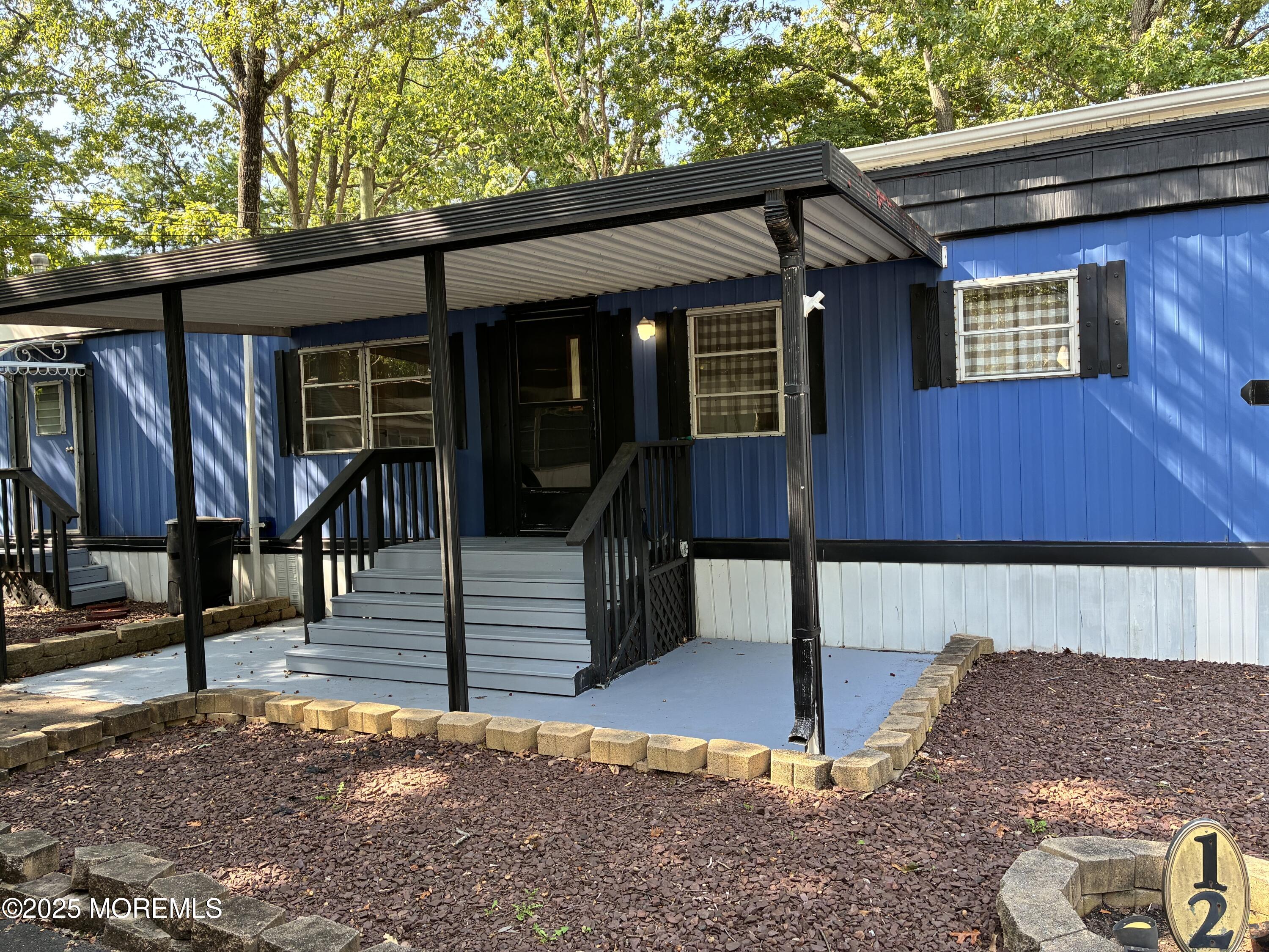 12 D Trail Brick, NJ 08724 - Photo 5 of 17 a view of outdoor seating space