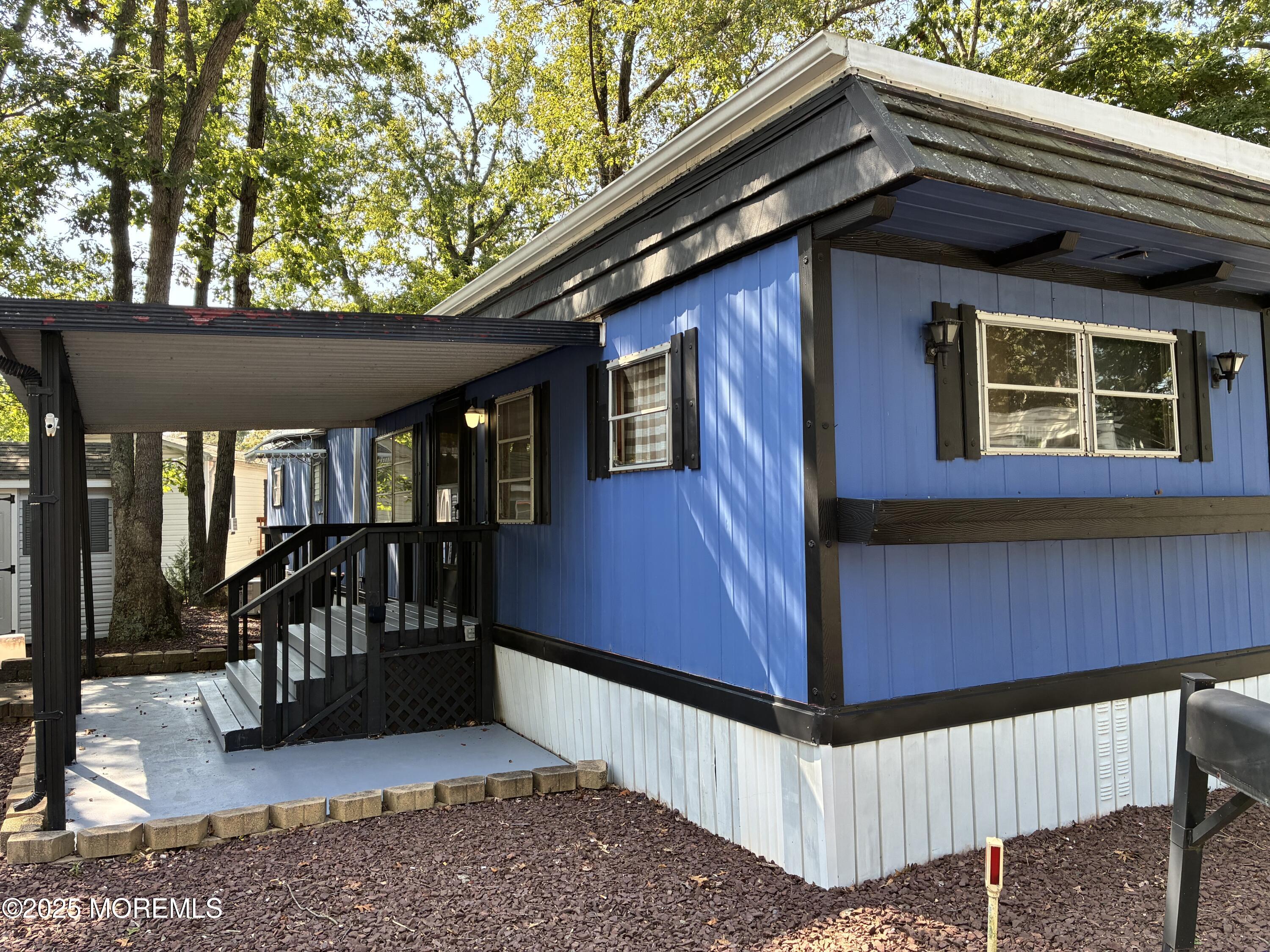 12 D Trail Brick, NJ 08724 - Photo 6 of 17 a house view with a outdoor space