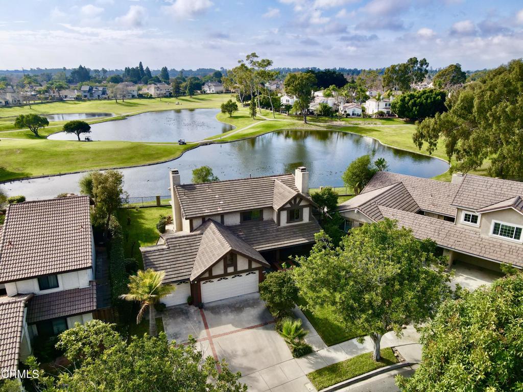 2134 Cold Stream Court Oxnard, CA 93036 - Photo 40 of 48 an aerial view of a house with a garden and lake view
