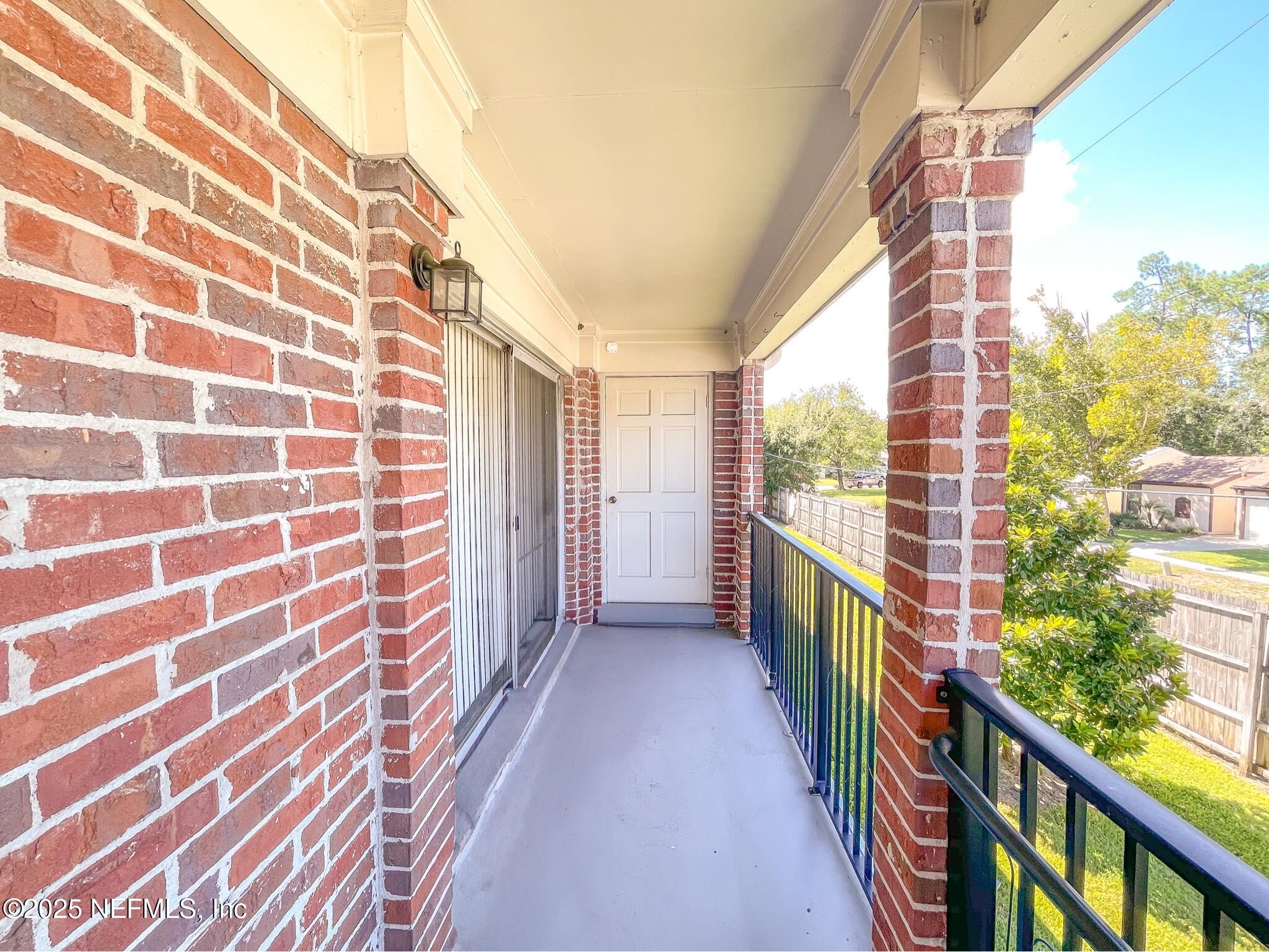 4915 Baymeadows Road, Unit 13D Jacksonville, FL 32217 - Photo 2 of 23 a view of a city from a balcony