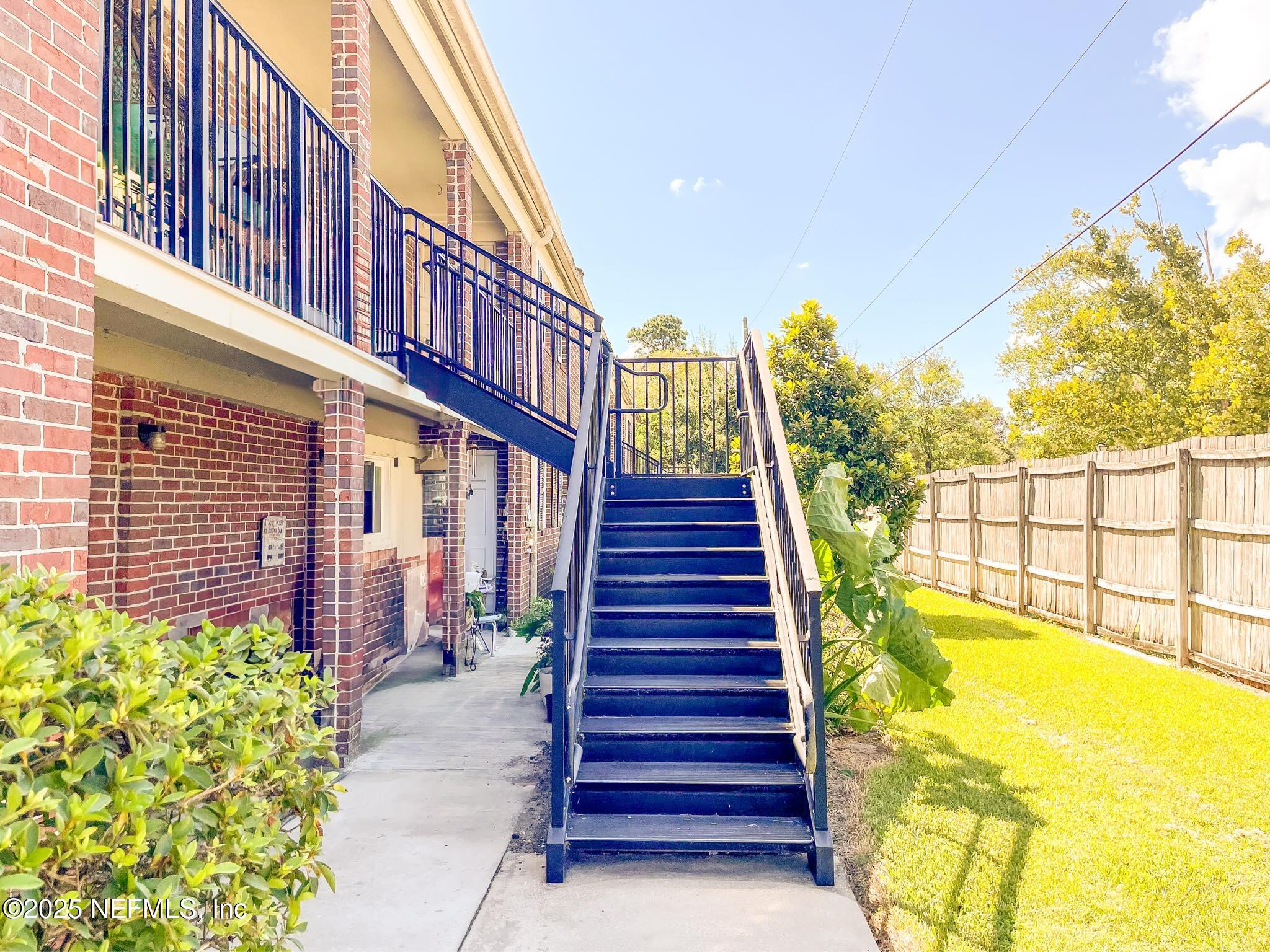 4915 Baymeadows Road, Unit 13D Jacksonville, FL 32217 - Photo 3 of 23 a view of swimming pool with an outdoor seating