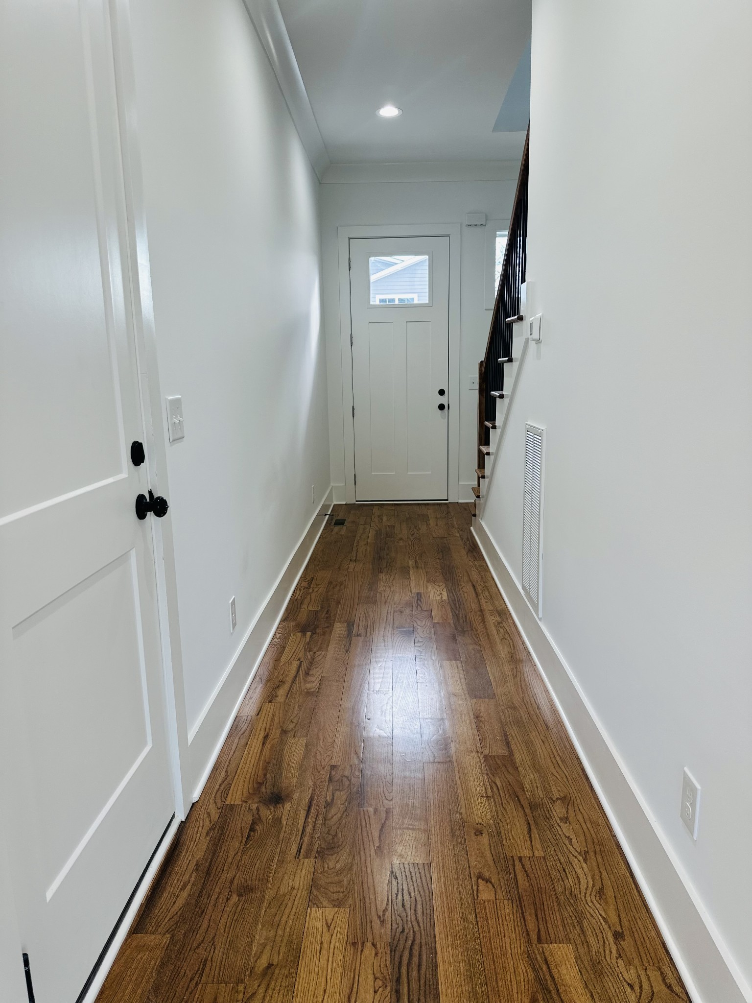 4334 Old Goins Road Nashville, TN 37211 - Photo 13 of 74 a view of a hallway with wooden floor and staircase