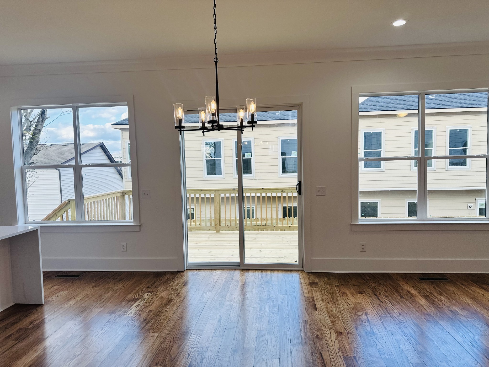 4334 Old Goins Road Nashville, TN 37211 - Photo 16 of 74 a view of an empty room with wooden floor and a window