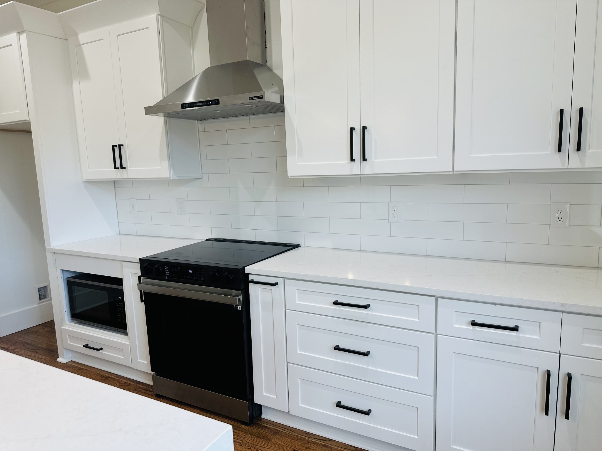 4334 Old Goins Road Nashville, TN 37211 - Photo 24 of 74 a kitchen with stainless steel appliances white cabinets and a stove