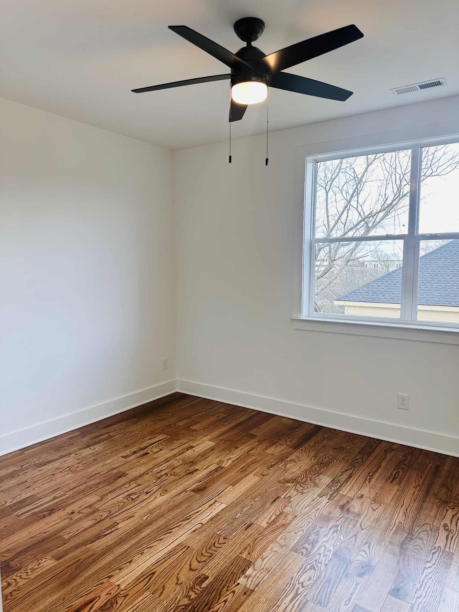 4334 Old Goins Road Nashville, TN 37211 - Photo 45 of 74 wooden floor in an empty room with a window