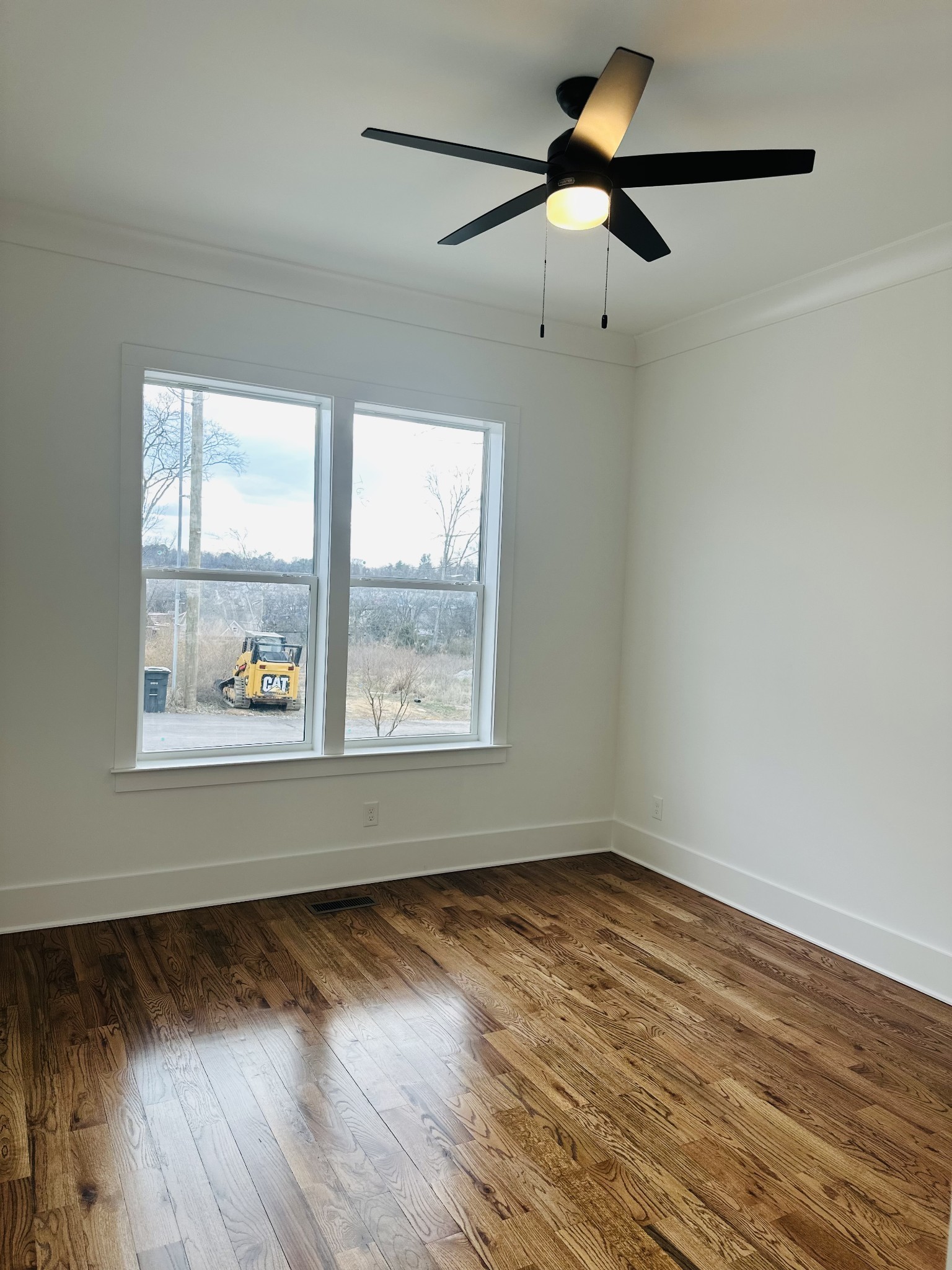 4334 Old Goins Road Nashville, TN 37211 - Photo 53 of 74 a view of an empty room with wooden floor and a window