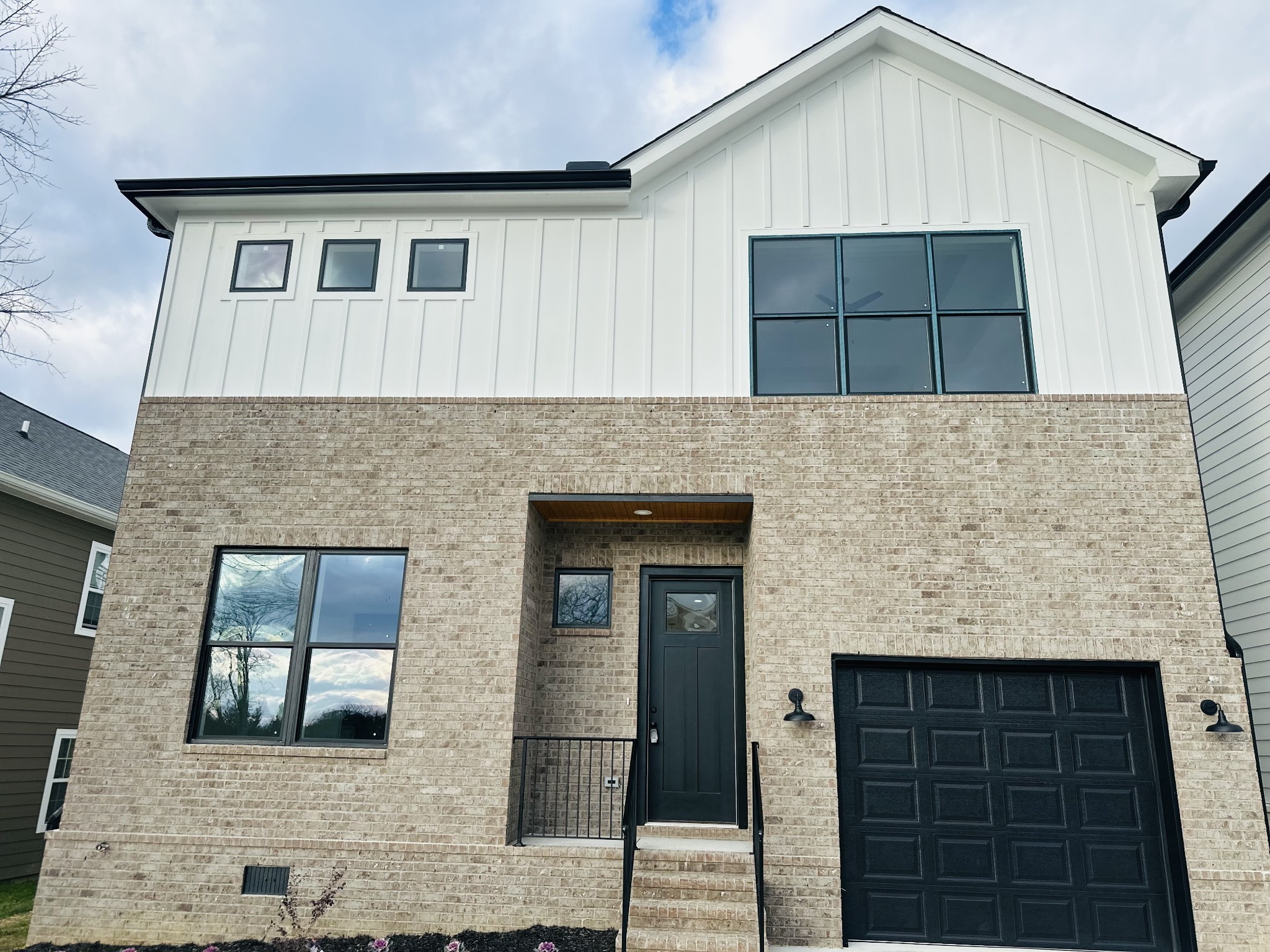 4334 Old Goins Road Nashville, TN 37211 - Photo 8 of 74 a front view of a house with large windows