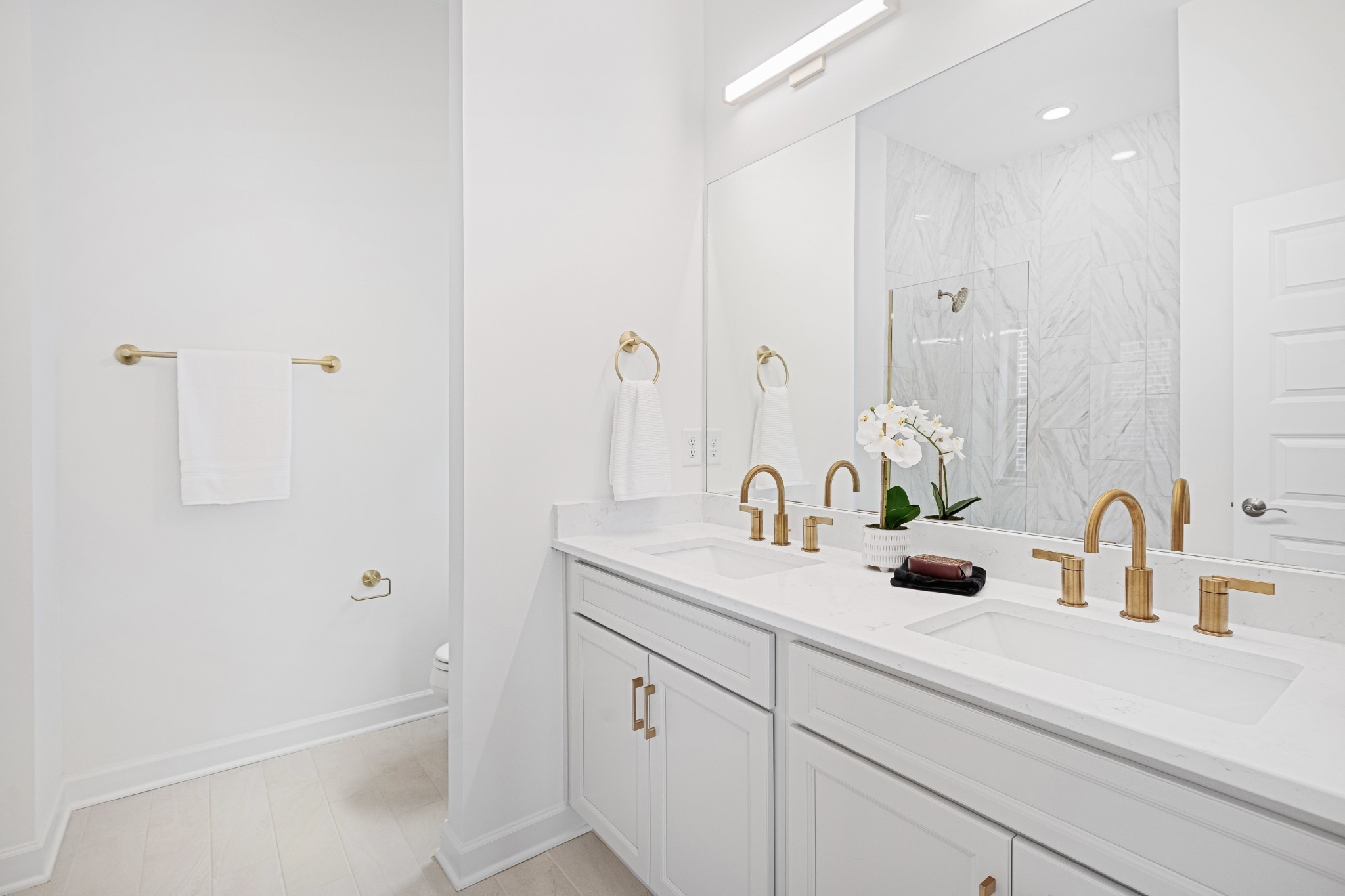 355 B Wellows Chase Spring Hill, TN 37174 - Photo 19 of 27 a bathroom with a sink and mirror with shower
