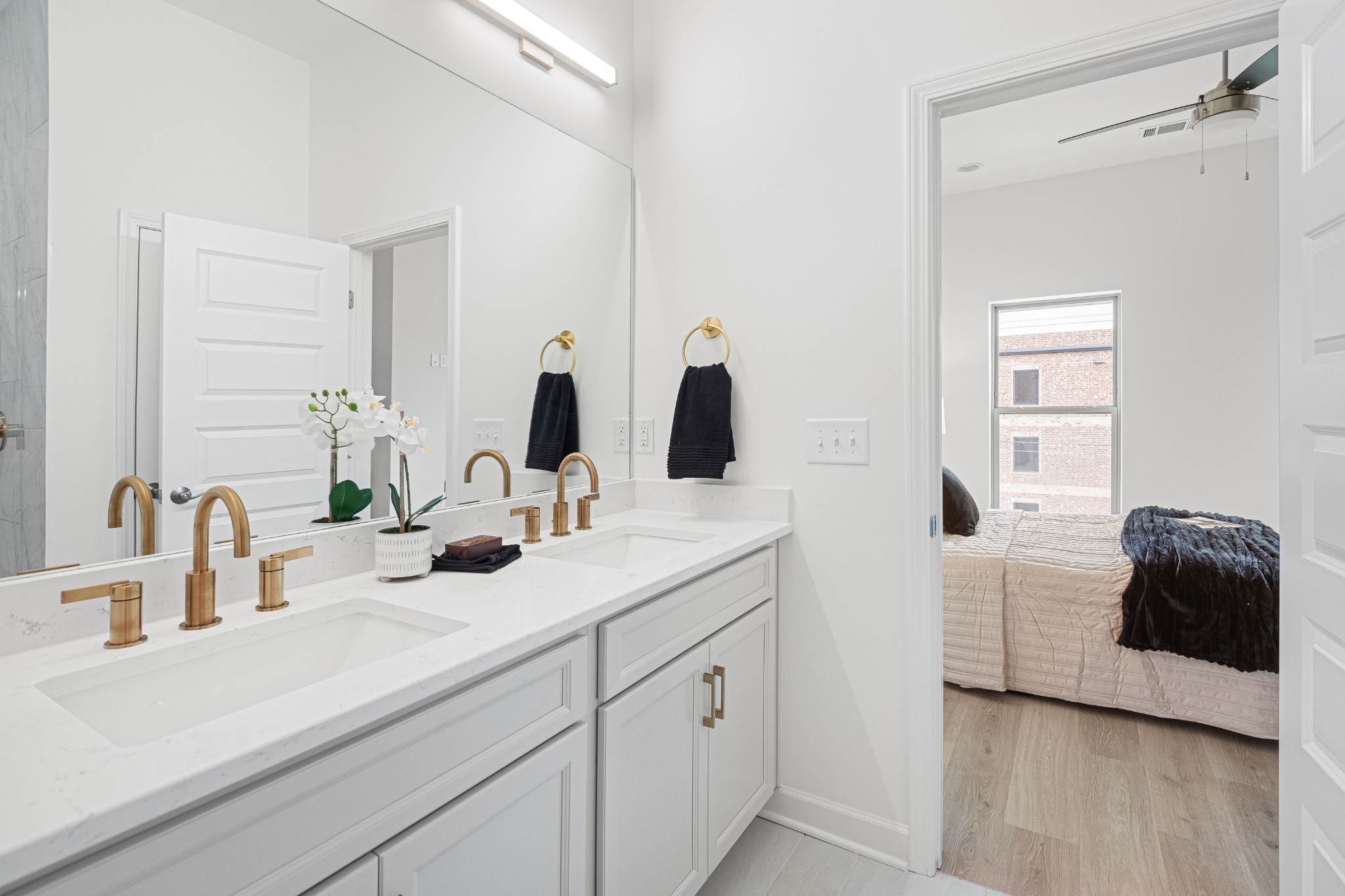 355 B Wellows Chase Spring Hill, TN 37174 - Photo 21 of 27 a bathroom with a double vanity sink and a mirror
