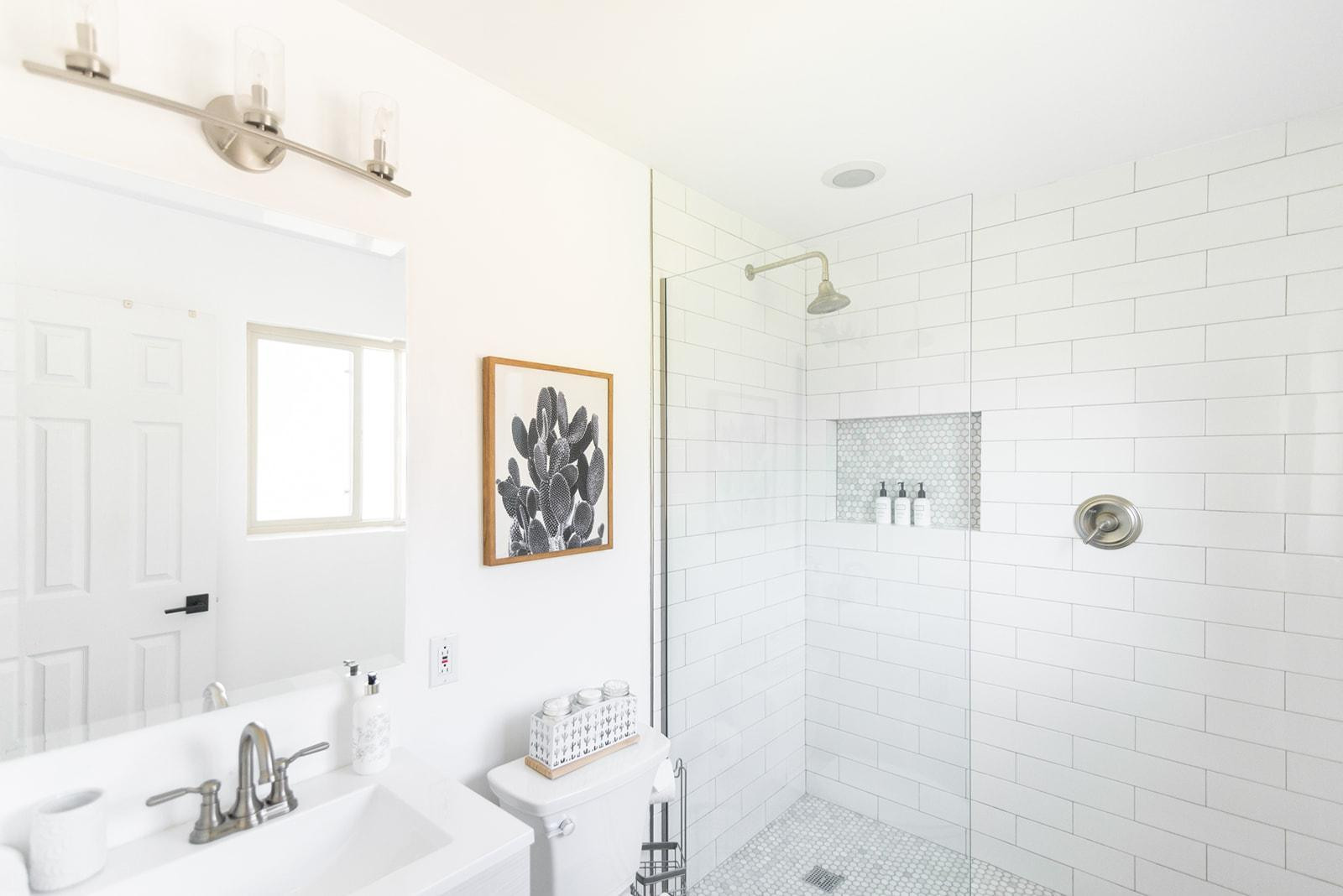 7435 East Granada Road Scottsdale, AZ 85257 - Photo 21 of 28 a bathroom with a sink a toilet and shower