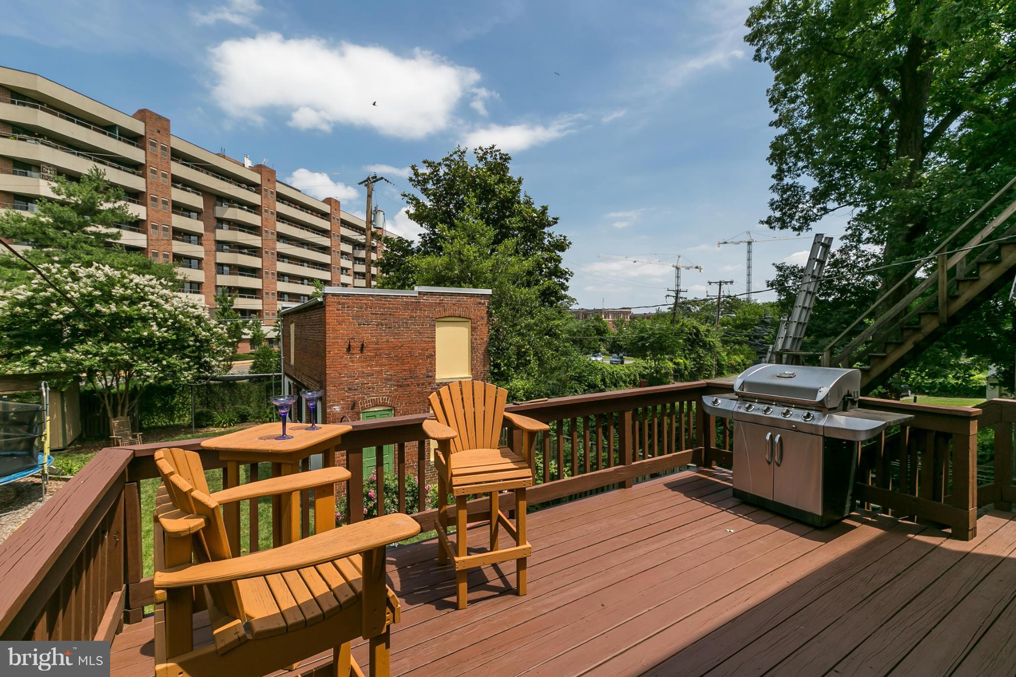 4015 Roland Avenue Baltimore, MD 21211 - Photo 25 of 30 a balcony with wooden floor and city view