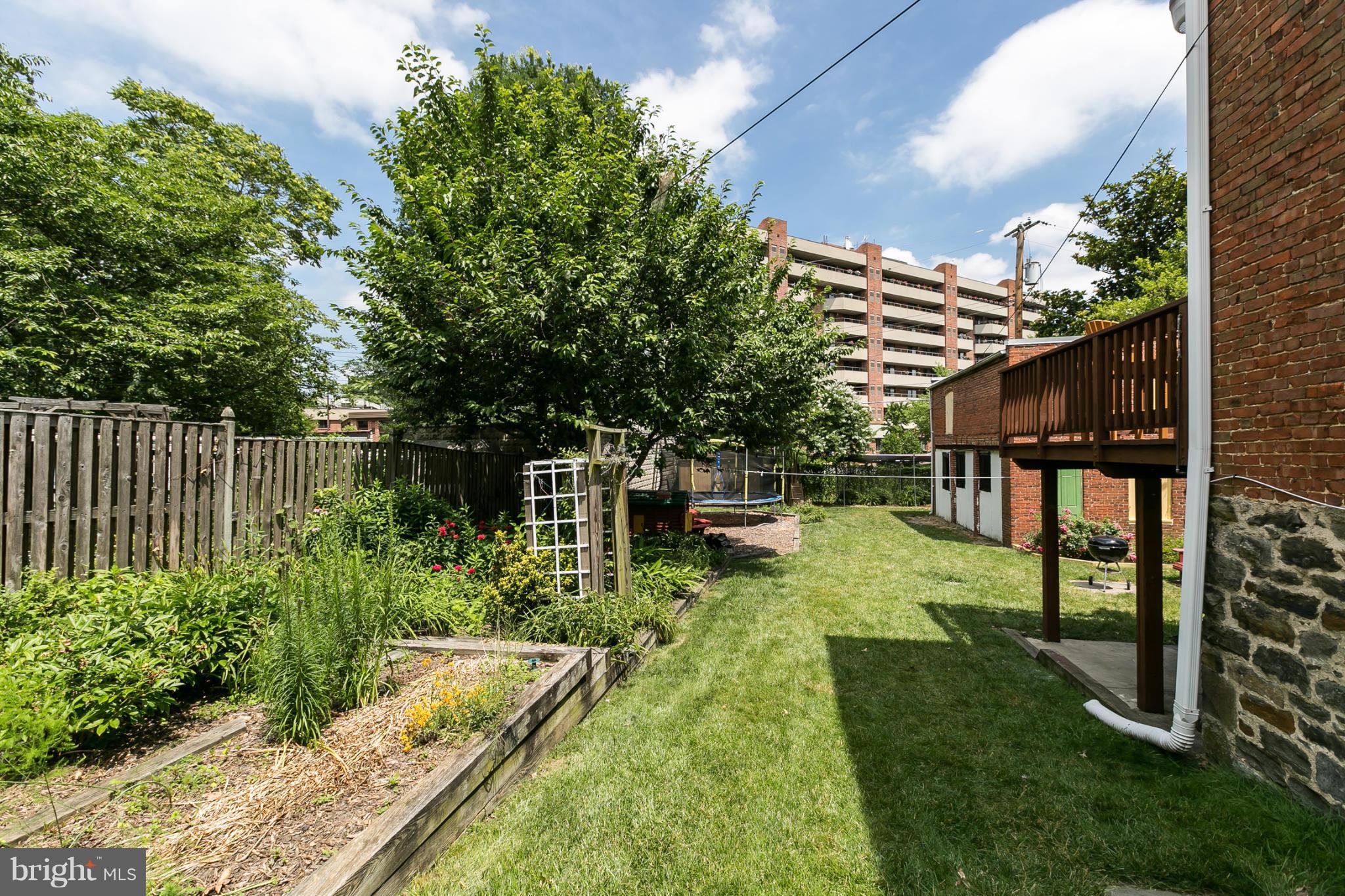 4015 Roland Avenue Baltimore, MD 21211 - Photo 26 of 30 a view of a house with backyard and sitting area